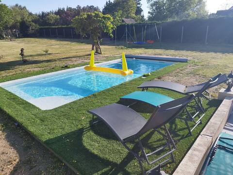 House on enclosed and wooded land in a quiet area.