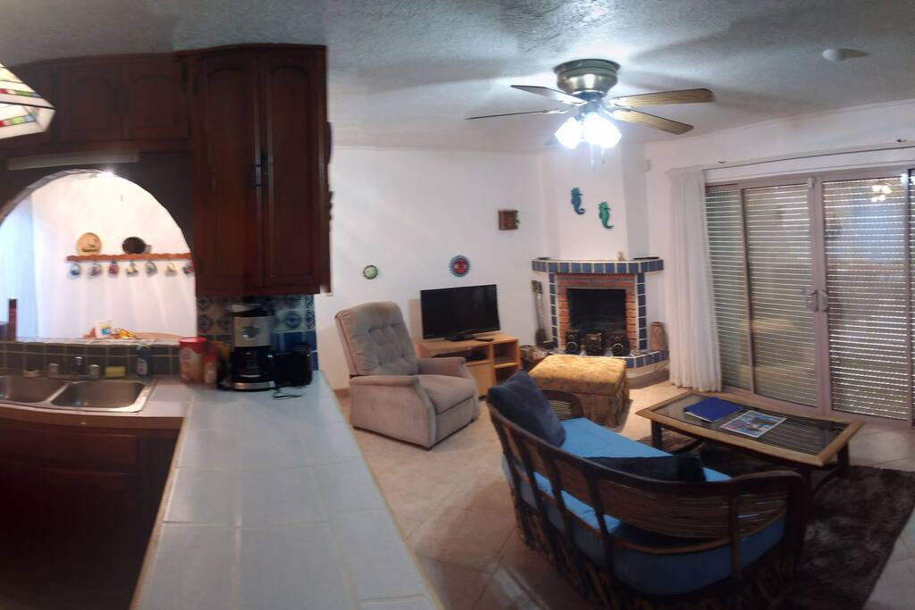 Great room with security electric windows for privacy.