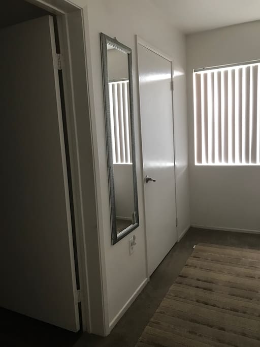 One door is the bathroom & the other is a walk in closet