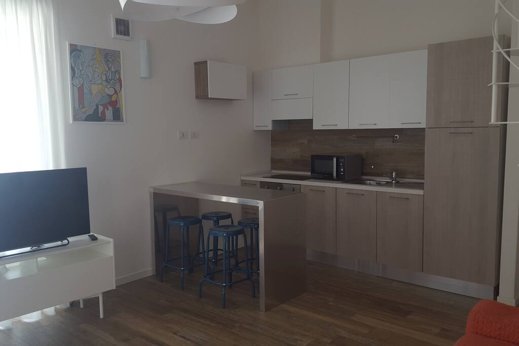 soggiorno angolo cucina