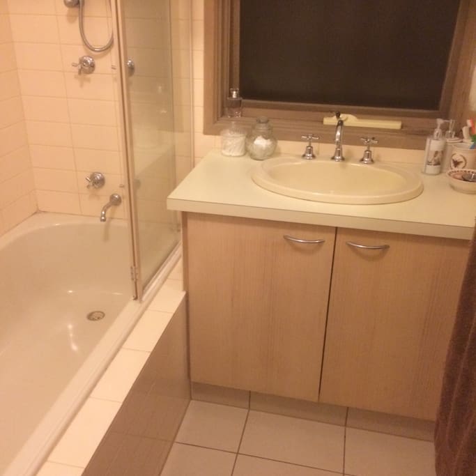 Guests private Bathroom . ( shower is over the bath ) private toilet for guests . Laundry and ironing facilities available to guests.