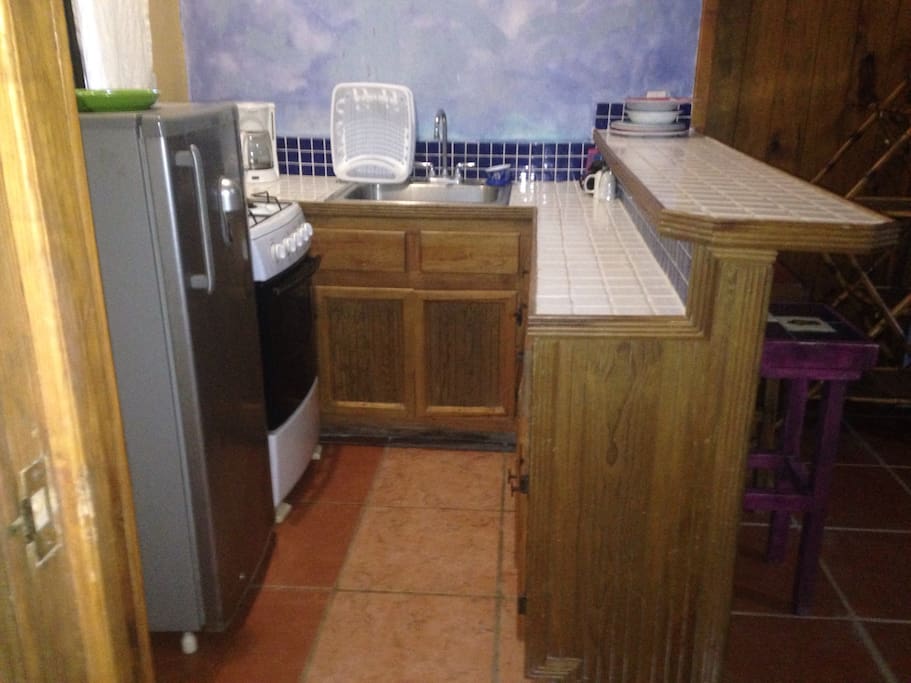 A full kitchen affords guests the ability to cook full meals.