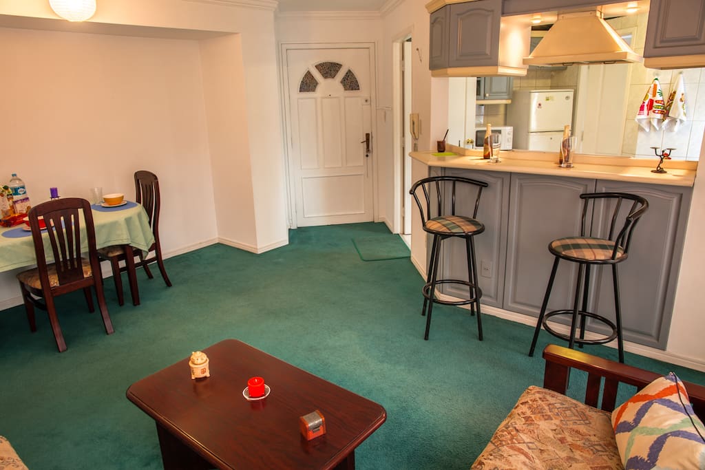 Main door, living room and bar