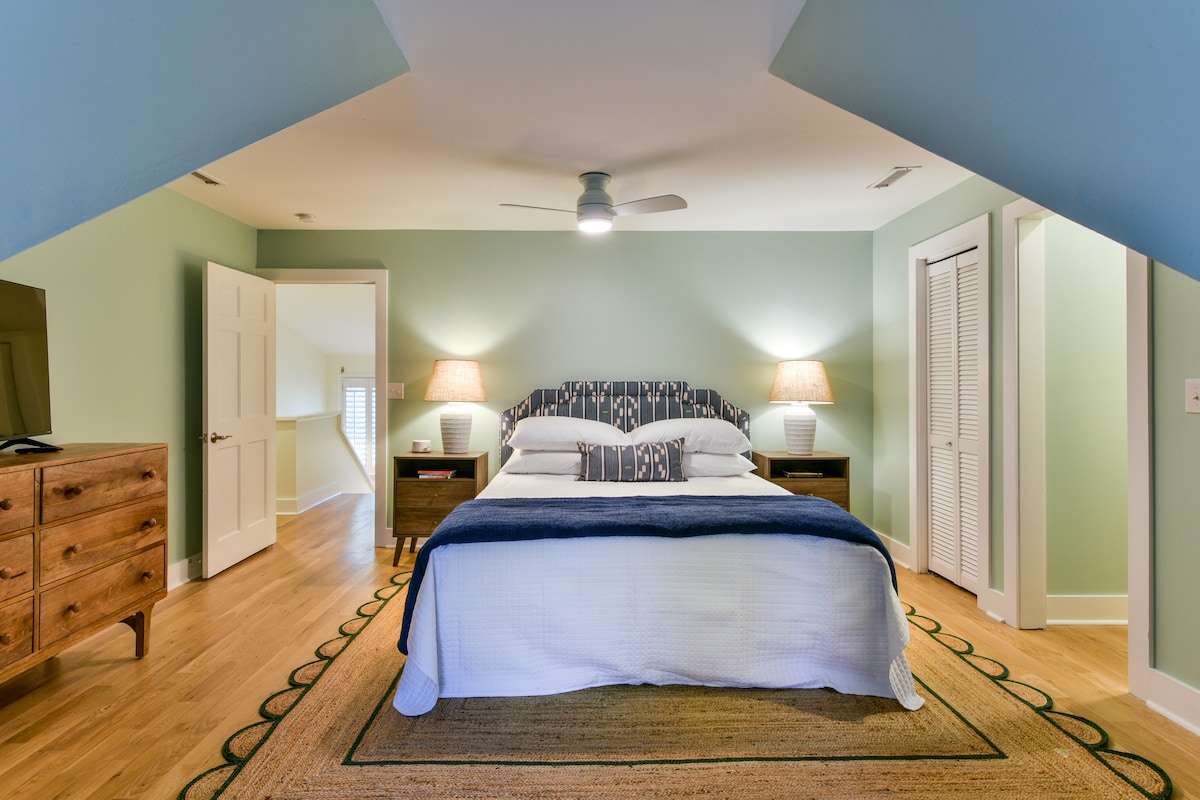 California King bed and 55” Roku TV make this “Green Room” perfect for lounging.  A connecting door to the “Grom Room” and a crib make it perfect for families.  