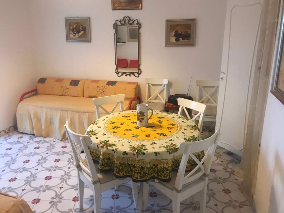 LIving with Capri floors and private Bathroom