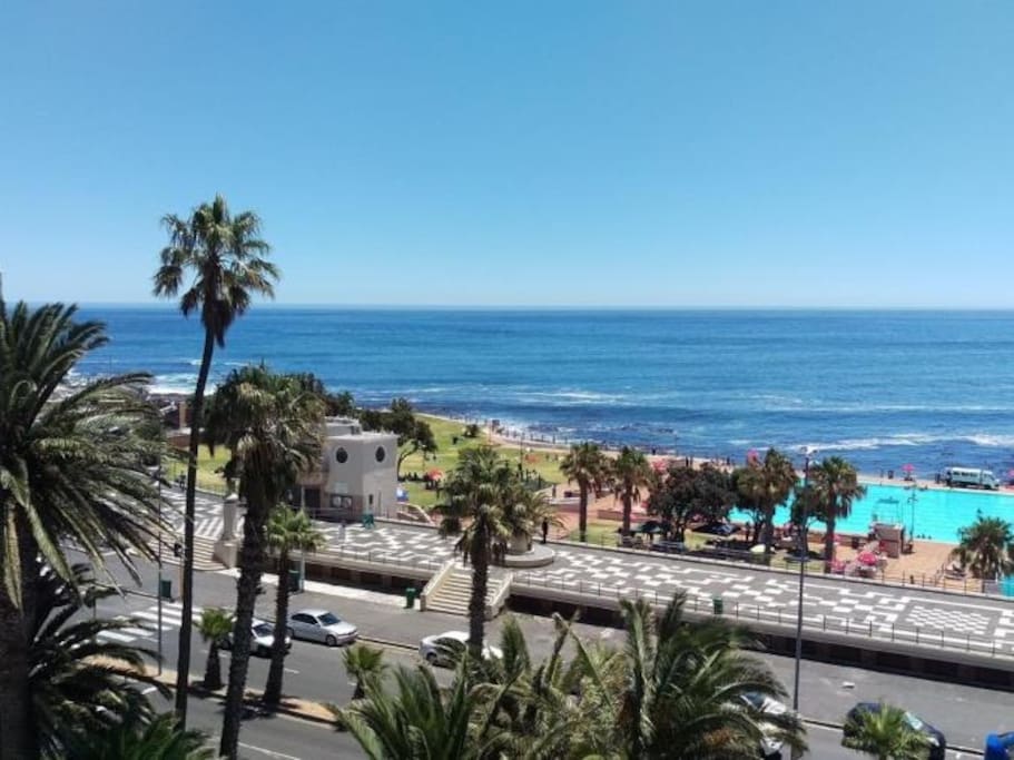 View on the promenade, public swimming pool and ocean from apartment