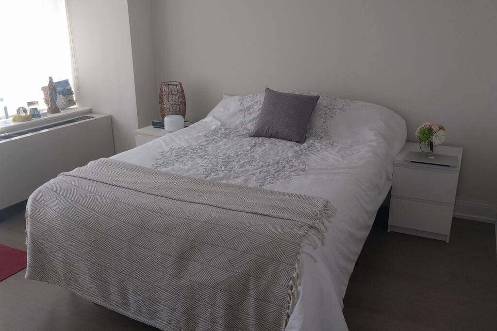 Most amazing cozy king size bed to come home to after walking in the city all day.