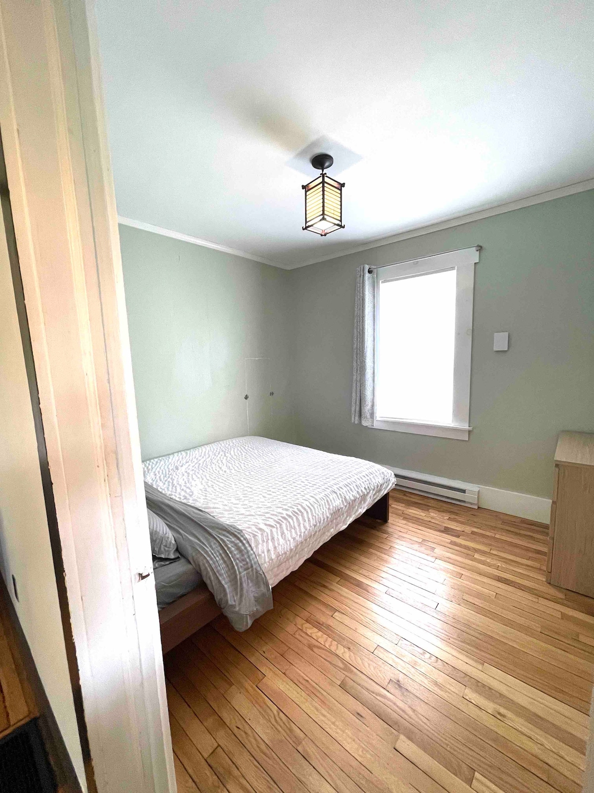Queen bedroom off the living room. 