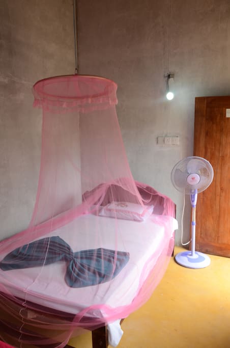 your single bed with mosquito net