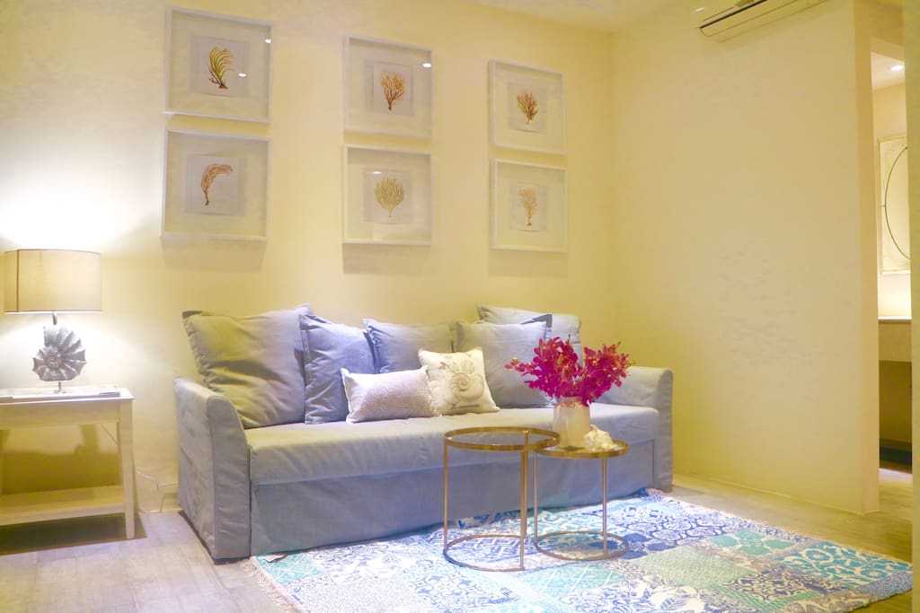 Looking toward the other side of the living room, this sofa is also a 3-persons sofa bed