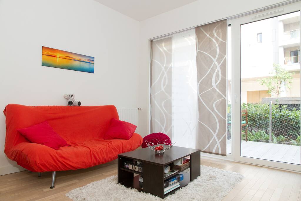 Sit back on the couch in the bright living room