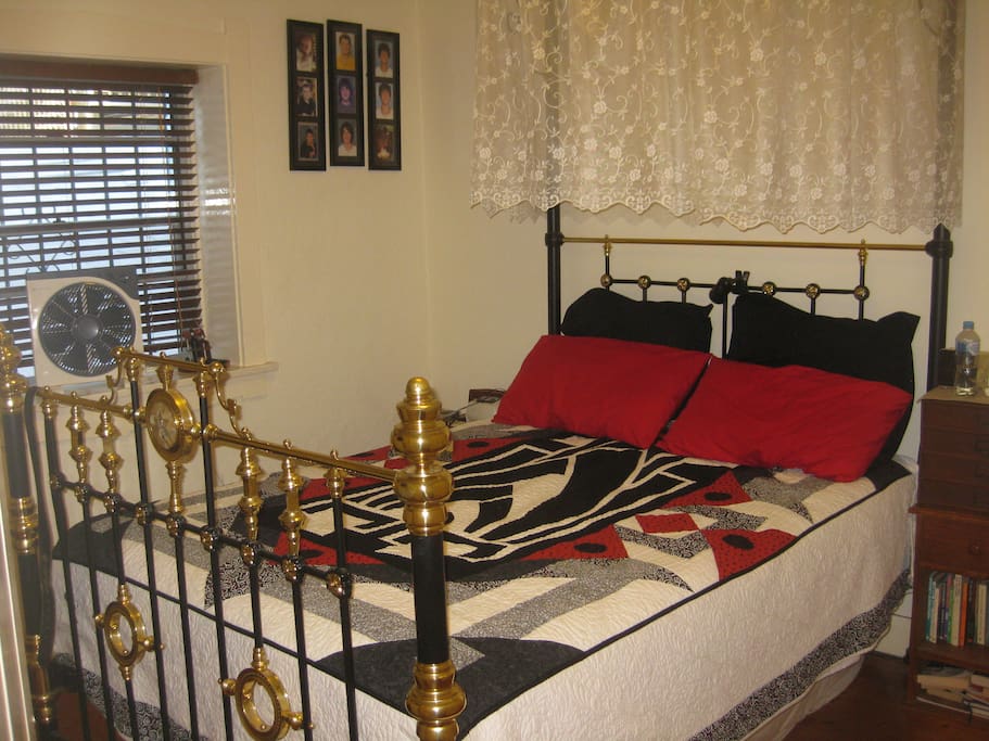 Main bedroom with antique queen bed