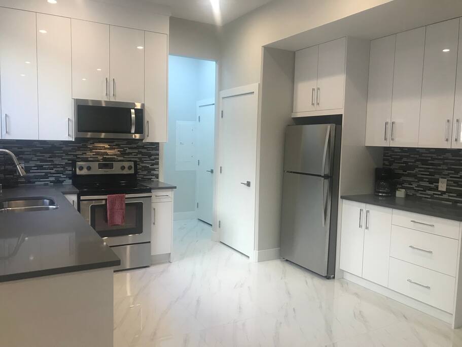 Fully equipped Kitchen. Includes coffee maker, microwave, stove, Fridge/ Freezer, all pots pans, plates and utensils.