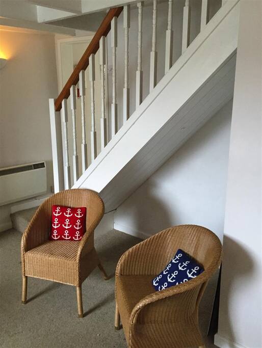Small sitting area ideal space for putting on walking boots.