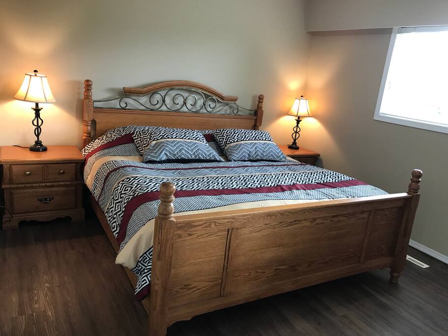 Tastefully furnished master bedroom with quality in mind to make your stay as comfortable as possible!