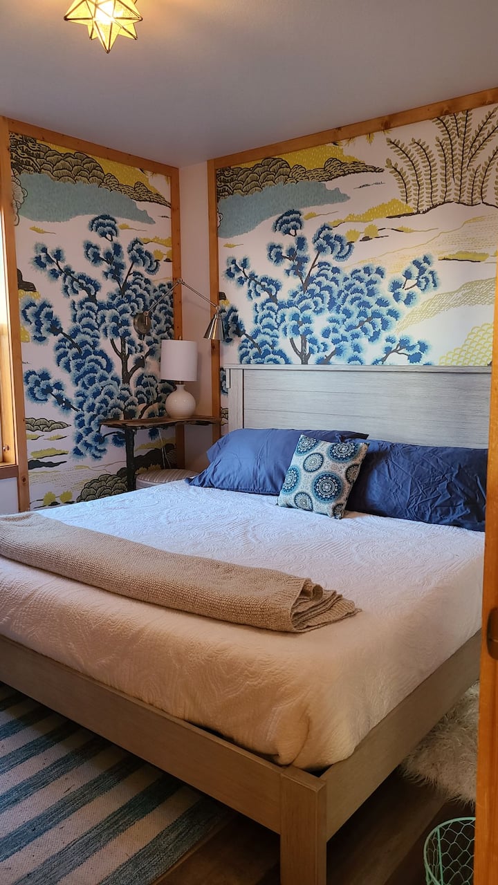 Main level King bedroom next to the spa bath. Most comfortable bed ever, if I do say so myself (as has everyone who's slept here). Double closet w/ hangers, cubbies & luggage rack. With its window to the ocean, hear the sounds rock you to sleep. 