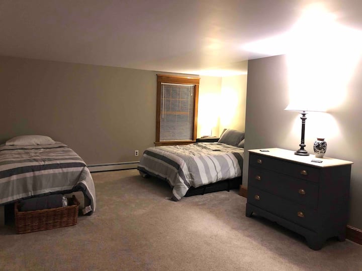 2nd floor master with attached 1/2 bath.  This room has a full sleeper sofa and Twin XL. When winter is over, this room will convert to a craft room with 7 individual stations. Perfect for girls weekend getaways or scrapbooking. 