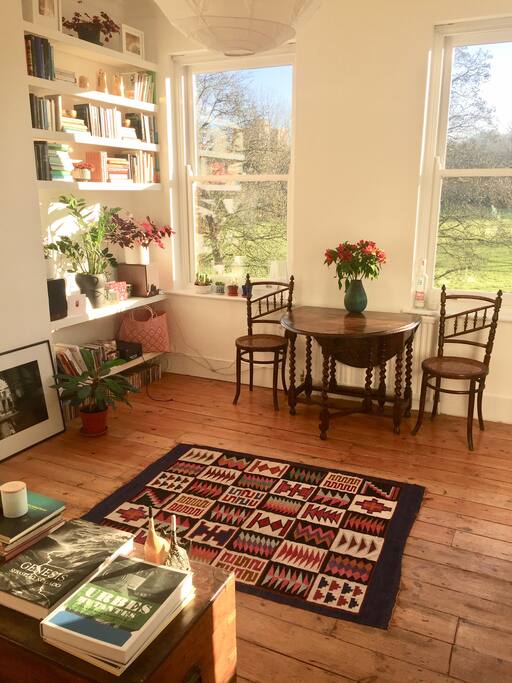 The open plan living room faces South over the park and receives a lot of light.