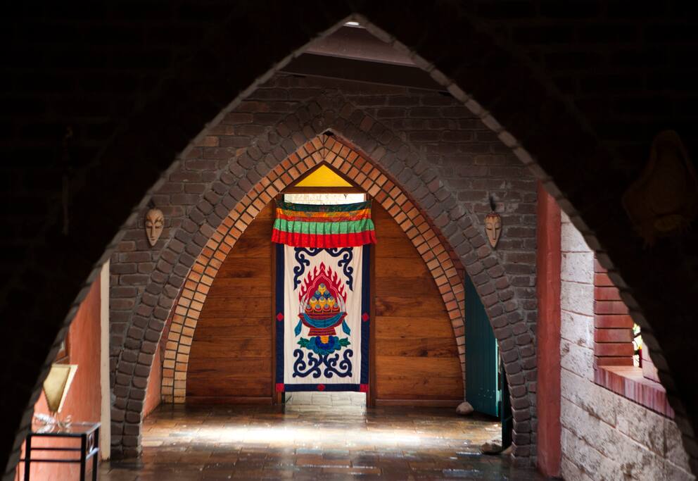 The main hallway features gothic arches