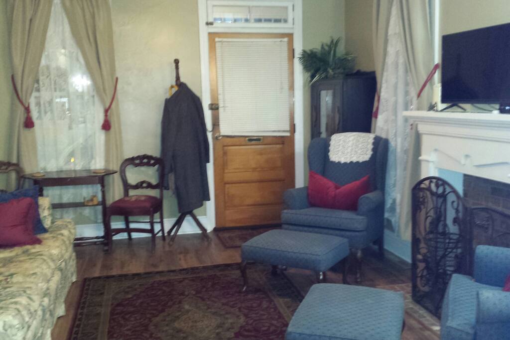 Comfy Living Room with flat screen TV and DVD player. Sofa sleeper for 2 in this room.