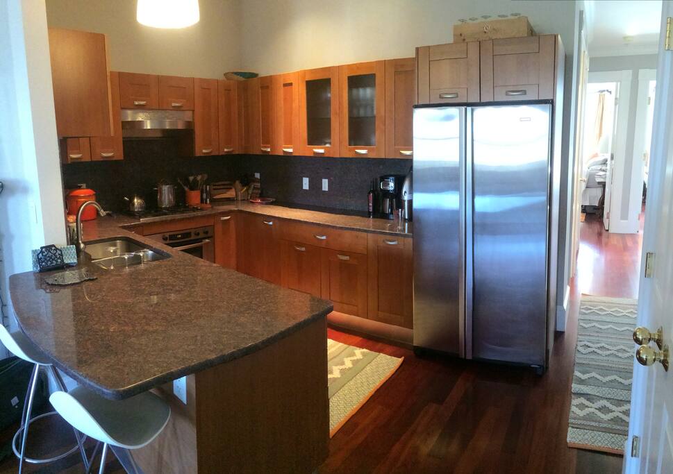 Our favorite place - the kitchen. You're welcome to make yourself at home as long as you help us keep it clean!