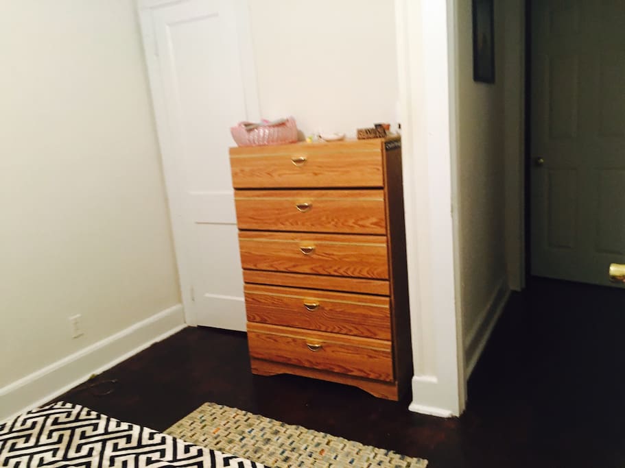 Private small closet and furniture.