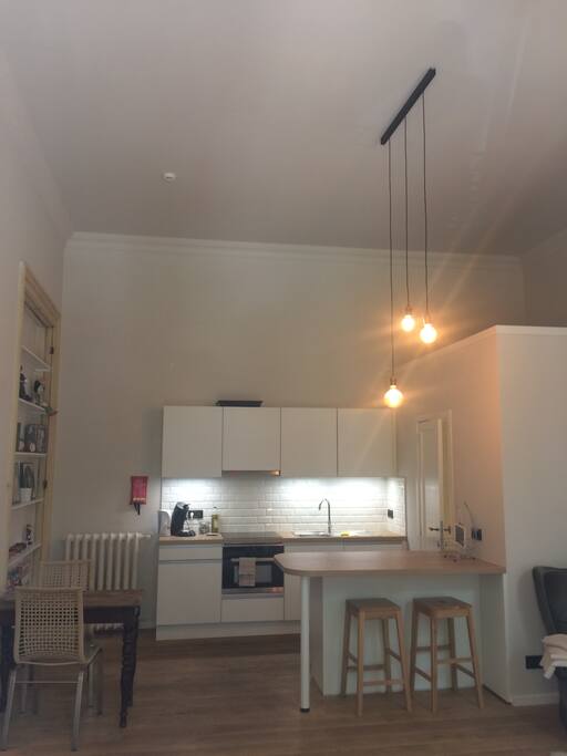 the kitchen with oven and microwave, senseo, induction cookinplate and hood