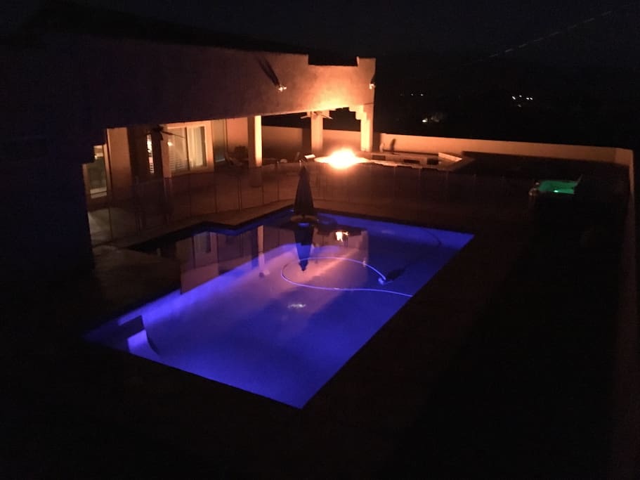 Solar heated outdoor pool with spa and fire pit as well as misters to keep you cool and a hot day in Havasu.