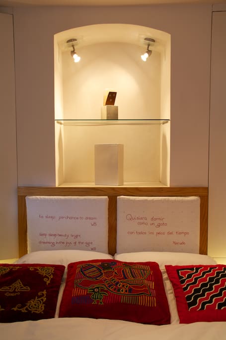 The cushioned headboards are embroidered with sleep-inducing poetry!