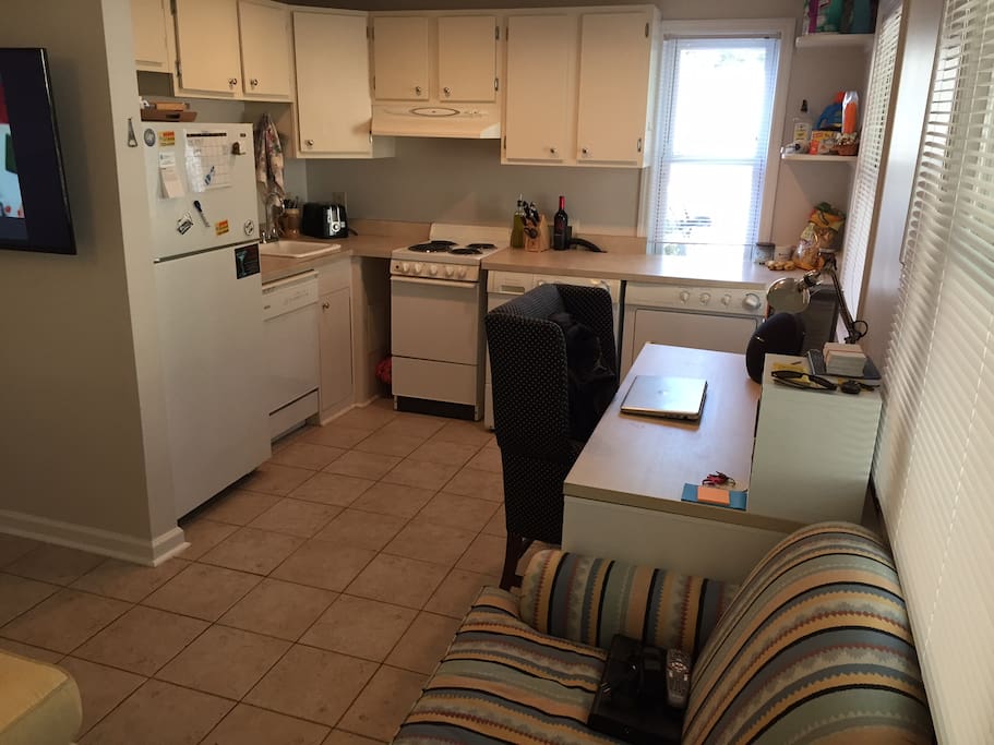 Kitchen with washer, dryer, dishwasher, and desk because I am a student at the Medical University of SC