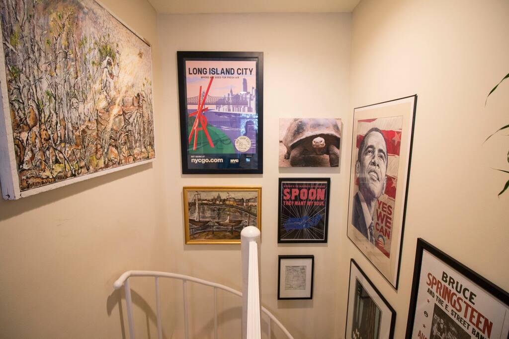 Art-filled apartment with a charismatic spiral staircase.
