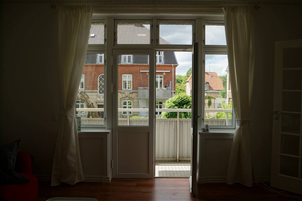 Balcony view over villa quarter and the open sky
