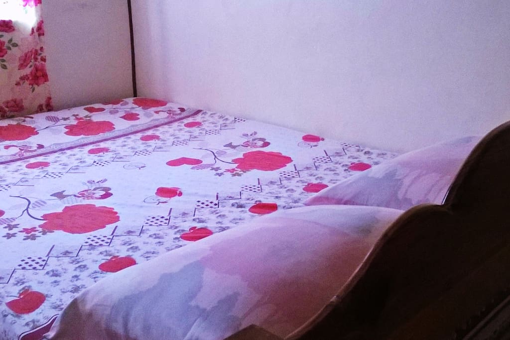 Bed by the window