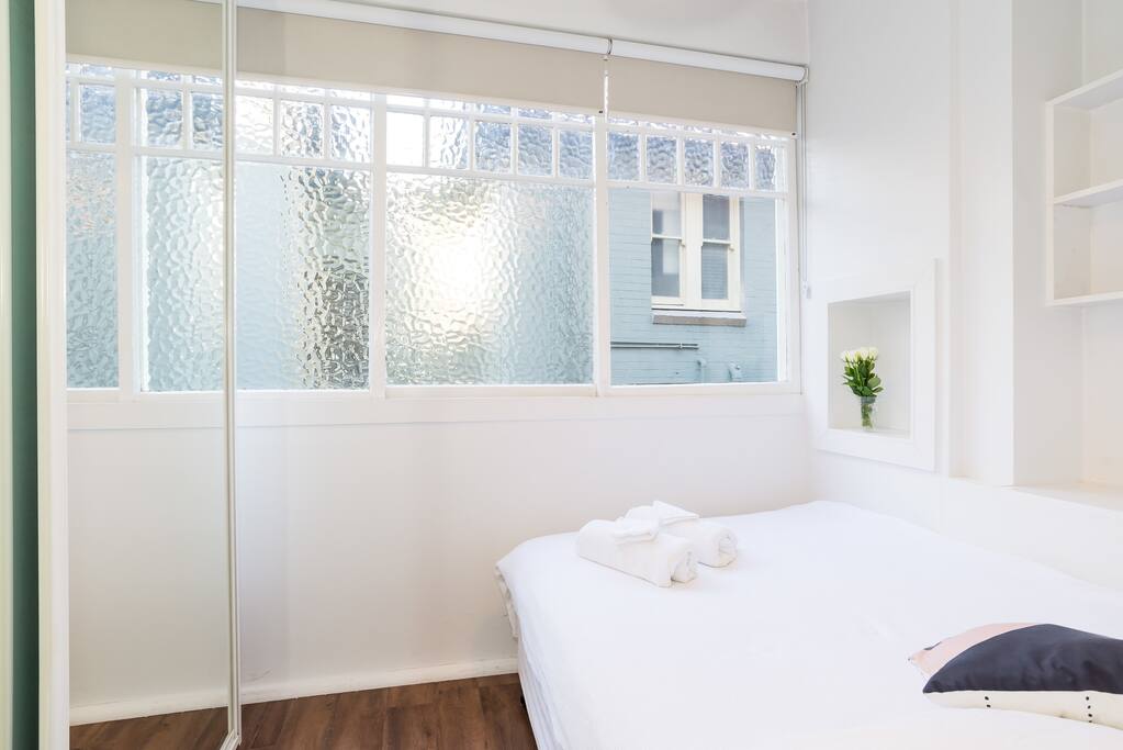 Sparkling clean double bedroom with fresh sheets and towels, blackout blinds and large built in double wardrobe for all your belongings