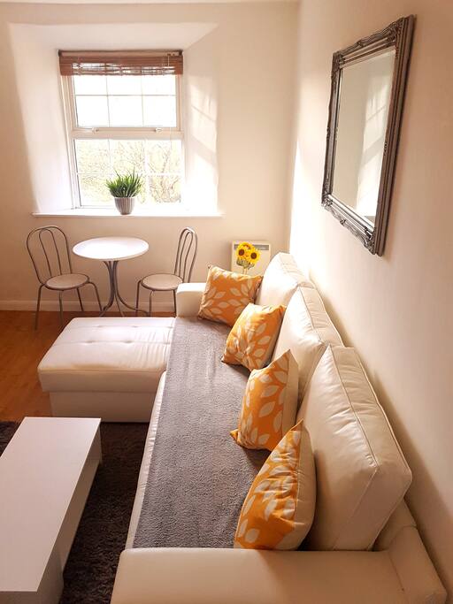 The front room sofa turns into a double bed and there's plenty of duvets, throws and extra pillows housed inside.