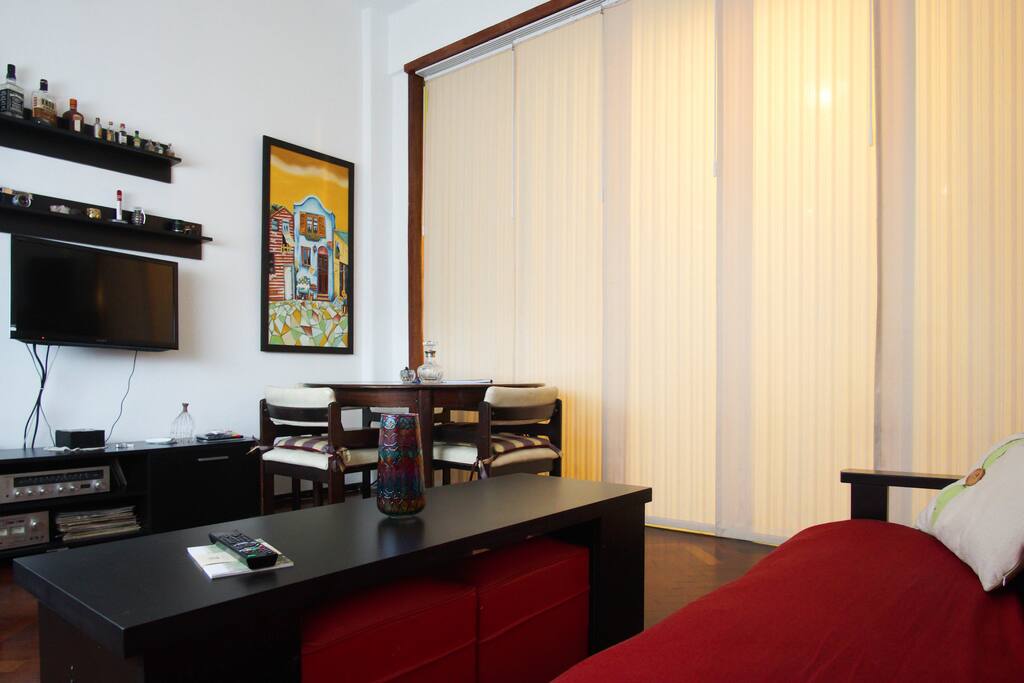 Oriental curtains to divide this room from the hallway and the kitchen