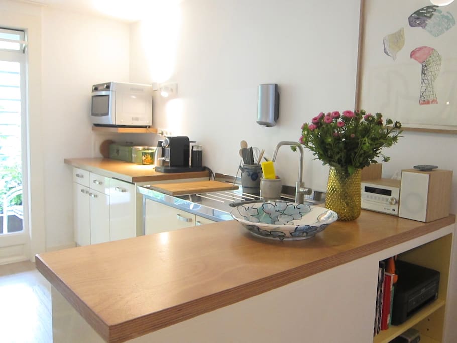 The kitchen has a microwave/oven, fridge, dishwasher, coffee and tea facilities, egg boiler, toaster