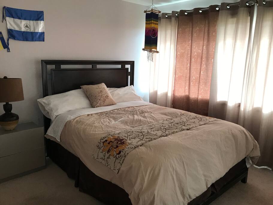 bedroom #1 (queen size bed) with beautiful view of horse lake from this room.