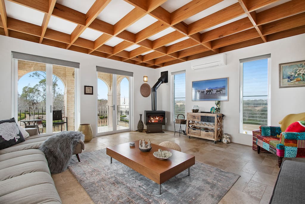 Living room with smart TV and combustion fire