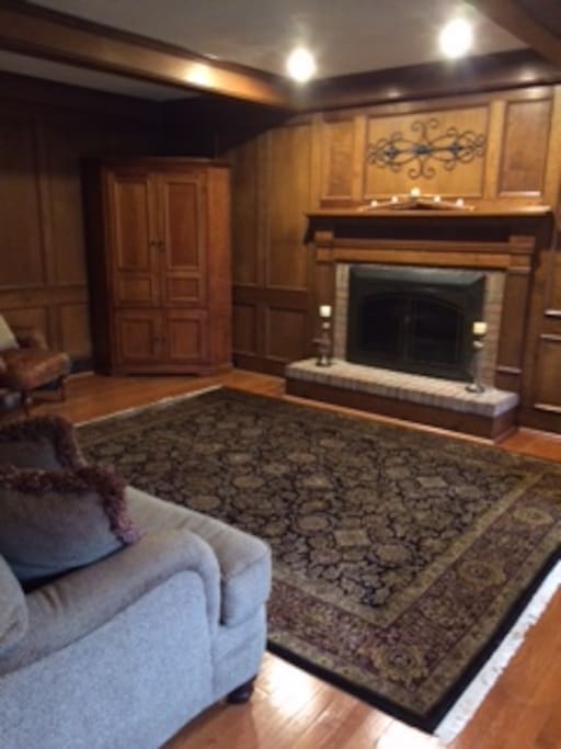 Family room with gas fireplace and TV
