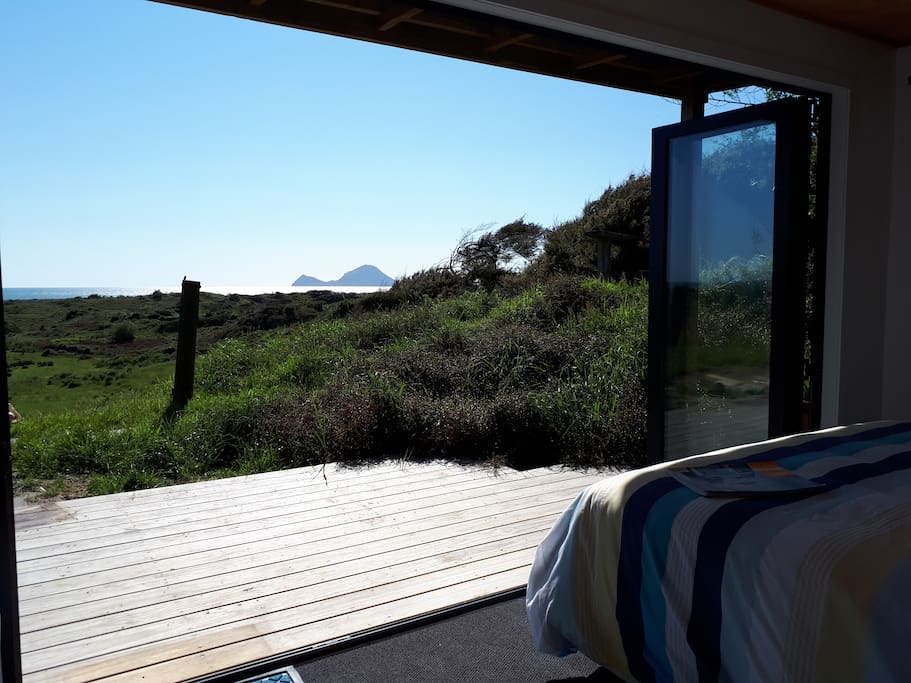 Wake up to spectacular views from bed....straight out to white island.
