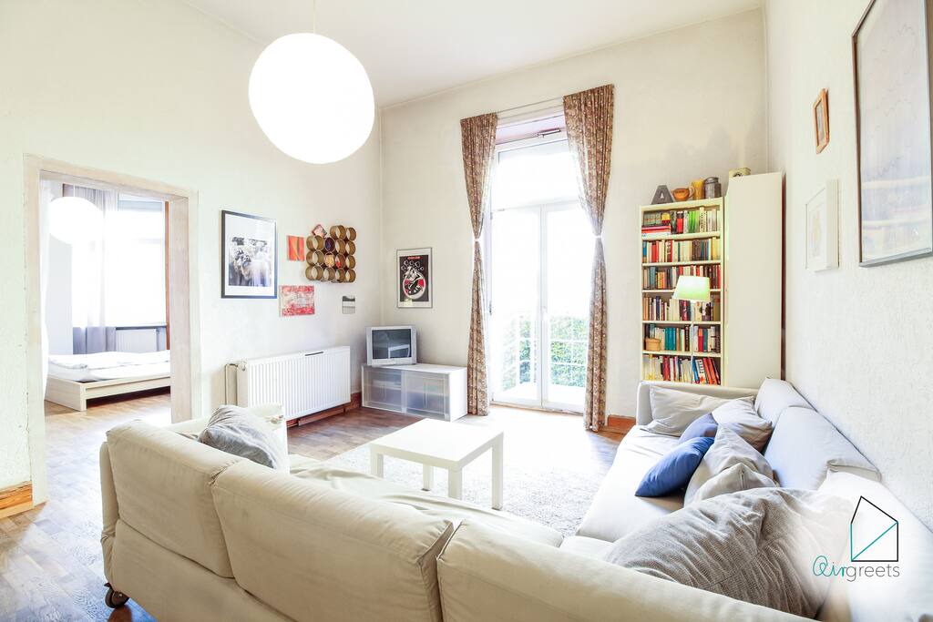 The living room is spacious and has a cozy atmosphere.