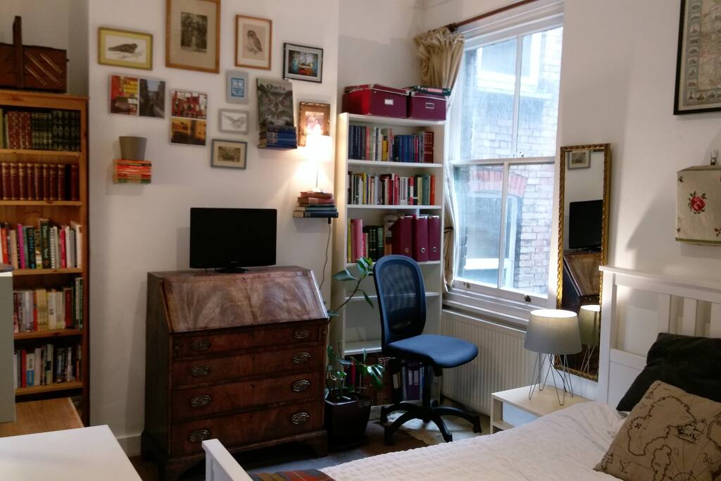 TV and a bureau that folds out into a desk