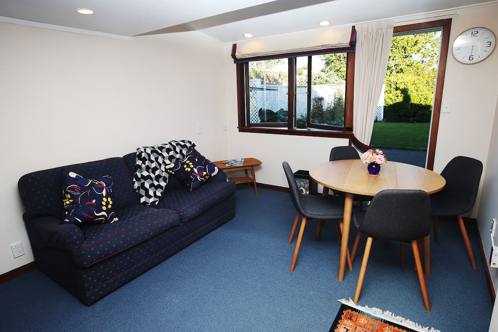 Comfortable living/dining space opening on to private garden.