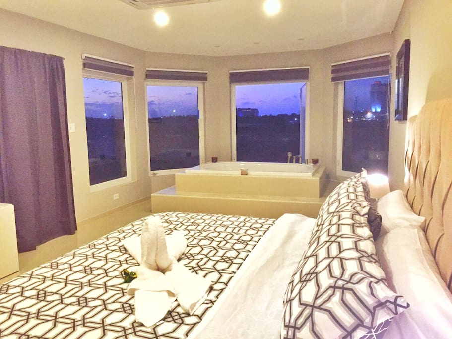 Master Suite second floor with Jacuzzi , Private Bathroom and Walk in Closet and private access to balcony
