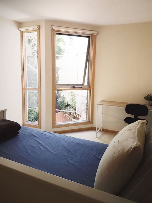Double sized room with natural light. Windows do have block out blinds.