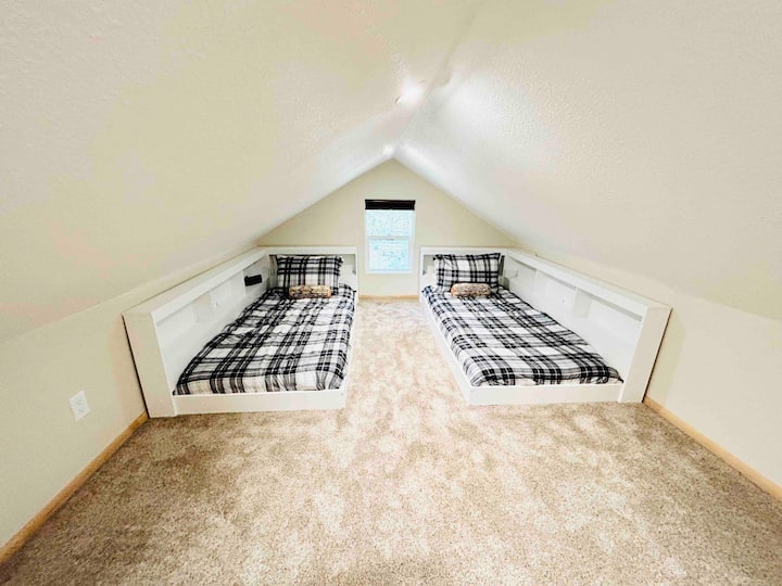 The upstairs low ceiling loft is perfect for kids or friends sharing a room. Bedding may differ from photo. The low ceiling loft is about 5ft at the peak.