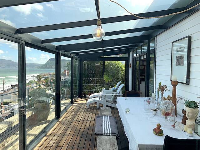 Contemporary beach house with elevated sea views. gallery image 3