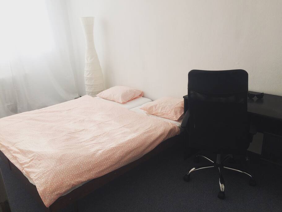 Cozy bed, and big working space.