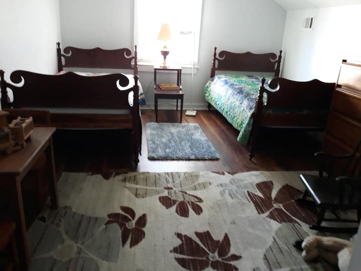 the two twin beds upstairs in second bedroom